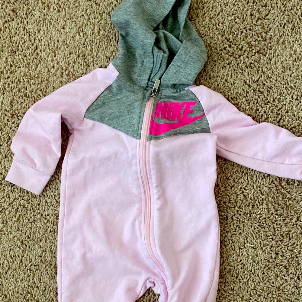 Pink and Grey Nike hoodie.